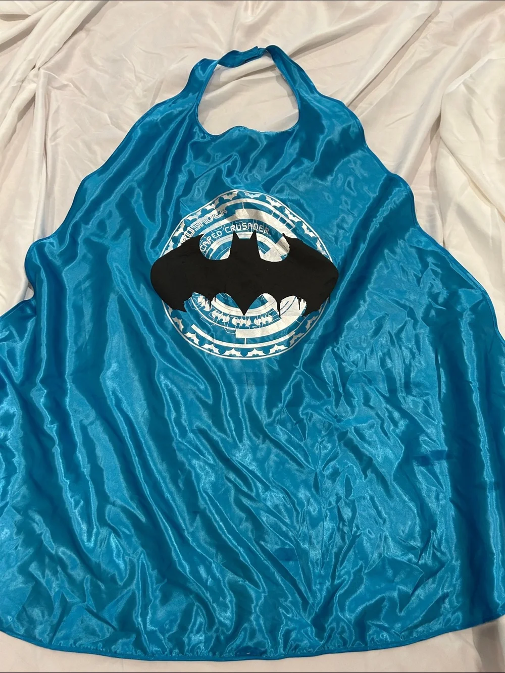 Bright blue Batman cape